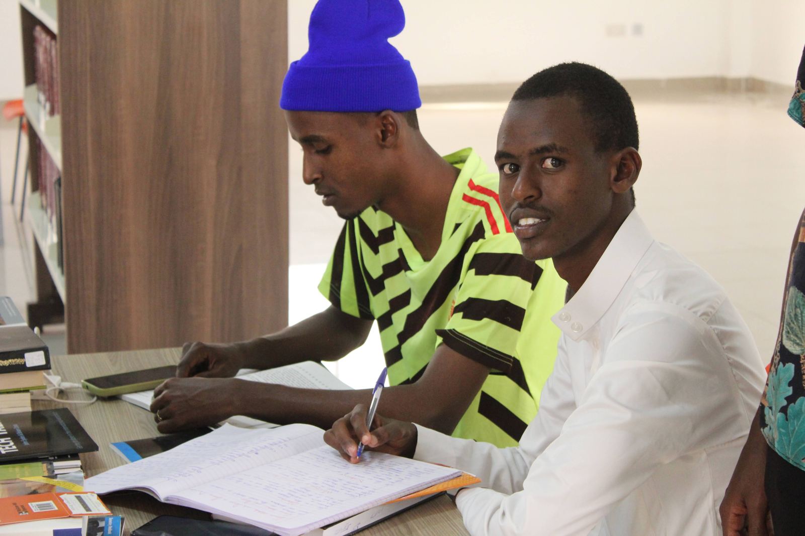 Students studying in the IUK library